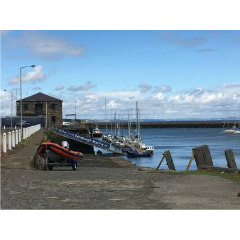 Photograph of Granton Harbour and a pier, showing the original hub of the harbour