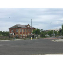 Photograph showing the Gas Works holder is on the left, Scottish HQ across the road on the left and the original station on the right