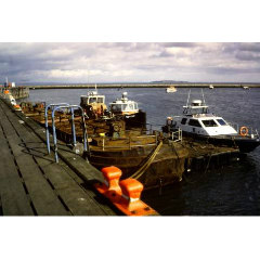 Color photograph of pilot boats on the Forth