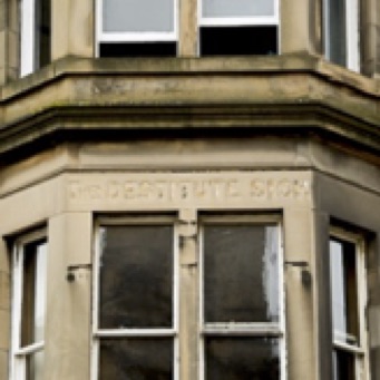 Inscription still visible on the building: The destitute sick