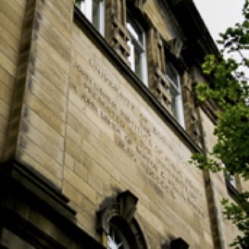 Inscription on the building: 'University of Edinburgh. The John Usher Institute of Public Health presented to the University by Mr John Usher of Norton & Wells, baronet. May, MDCCCCII'.
