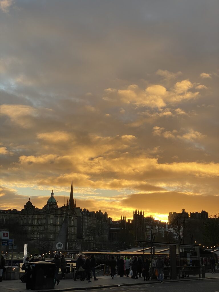 Skyline silhouette with yellow-grey cloudy sky in the background.