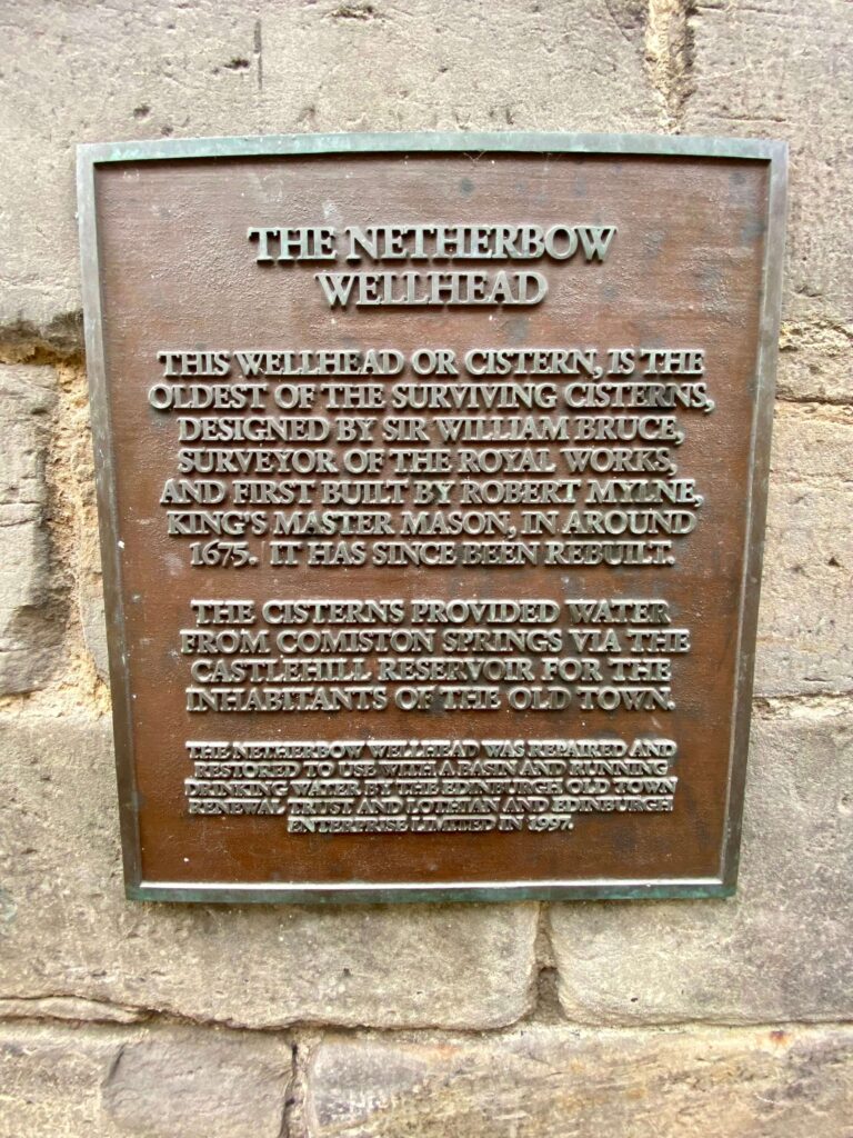 Informational bronze plaque with details on The Netherbow Wellhead.